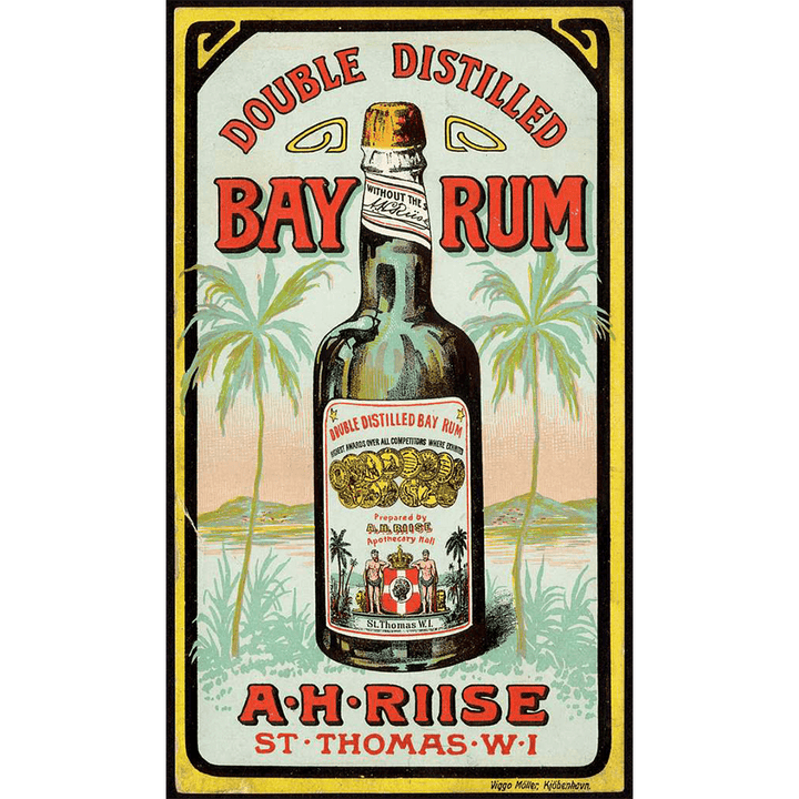 Vintage advertisement for A.H. Riise Double Distilled Bay Rum, featuring tropical elements and bold typography.