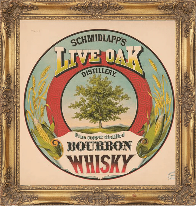 Vintage label for Schmidlapp's Live Oak Distillery bourbon whisky, featuring a tree and ornate design.