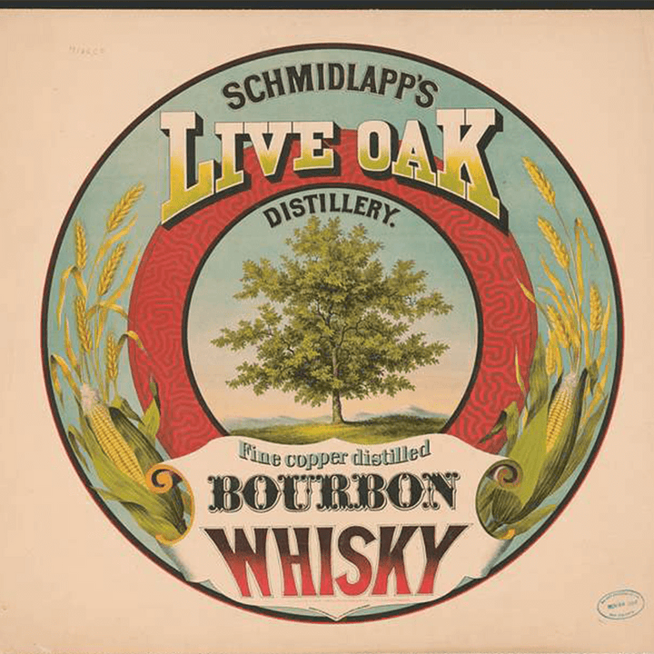 Vintage label for Schmidlapp's Live Oak Distillery bourbon whisky, featuring a tree and ornate design.